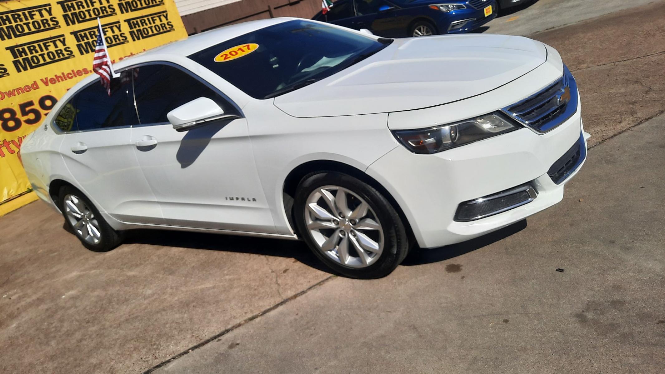 2017 Chevrolet Impala (2G1105S32H9) , located at 16710 Clay Rd., Houston, TX, 77084, (281) 859-7900, 29.834864, -95.656166 - Photo #1